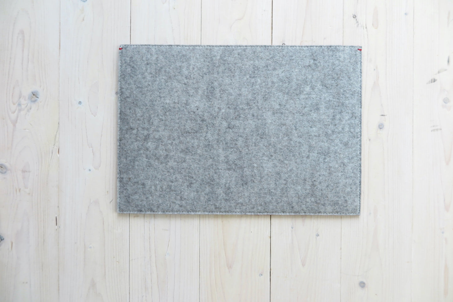 100% wool felt laptop cover in gray and orange, leather closure and extra box