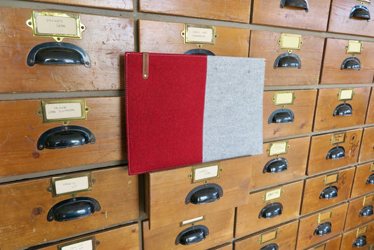 100% wool felt laptop cover in gray and orange, leather closure and extra box
