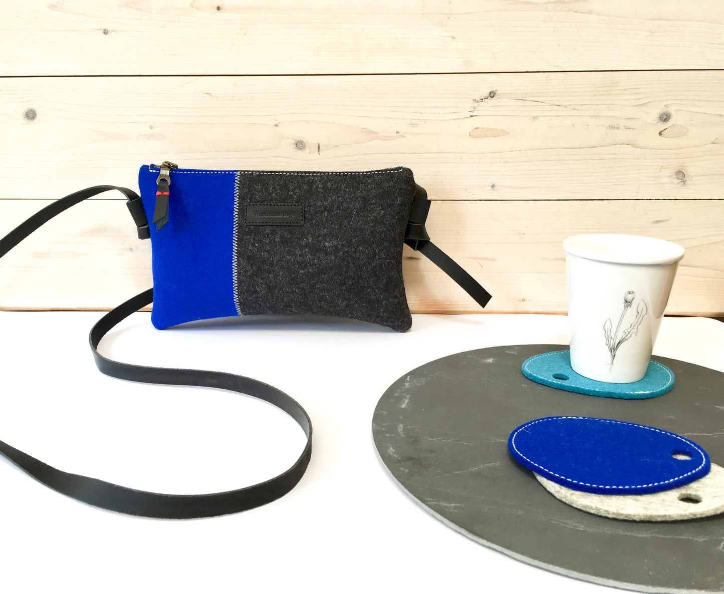 Wool felt crossbody zipper bag in blue and black