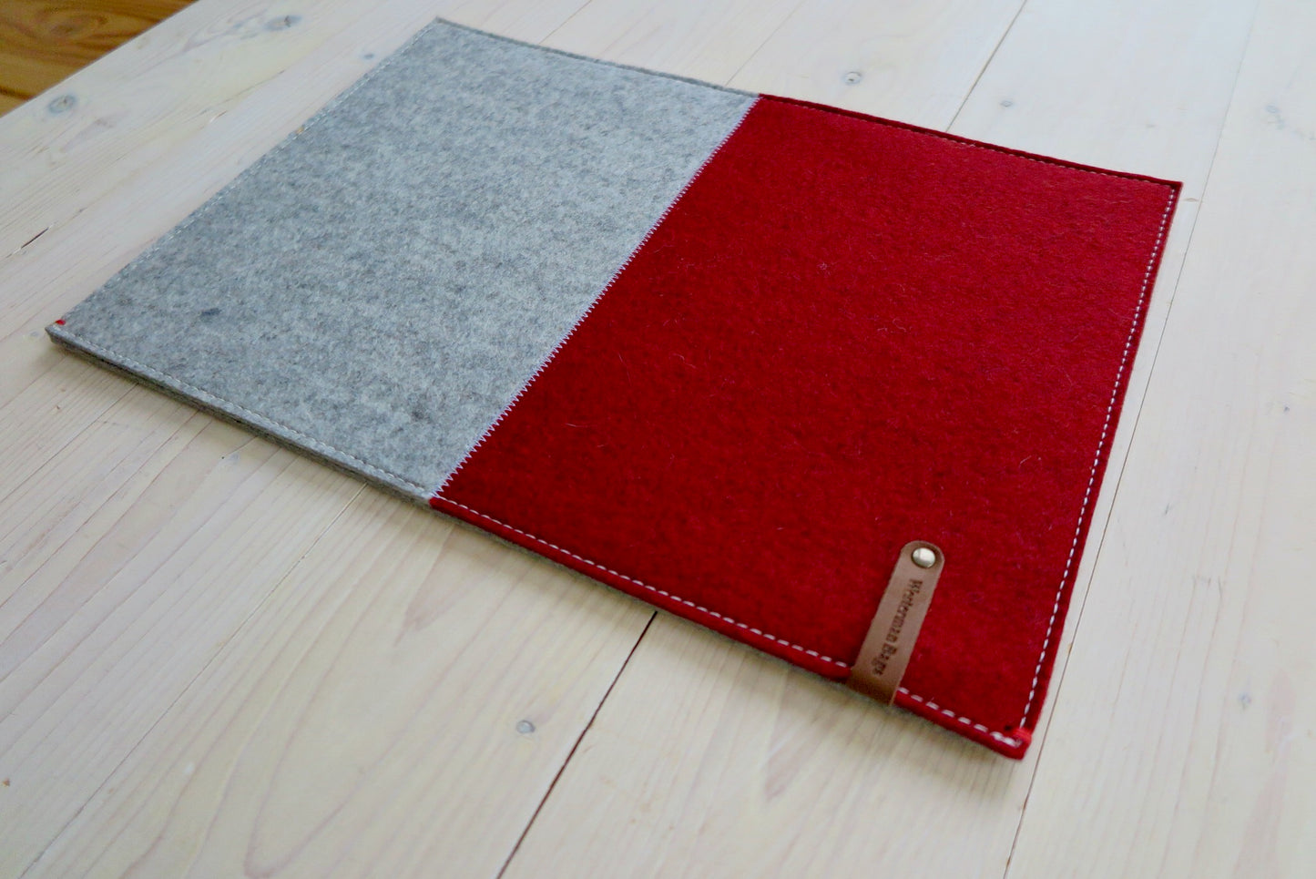 100% wool felt laptop cover in gray and orange, leather closure and extra box