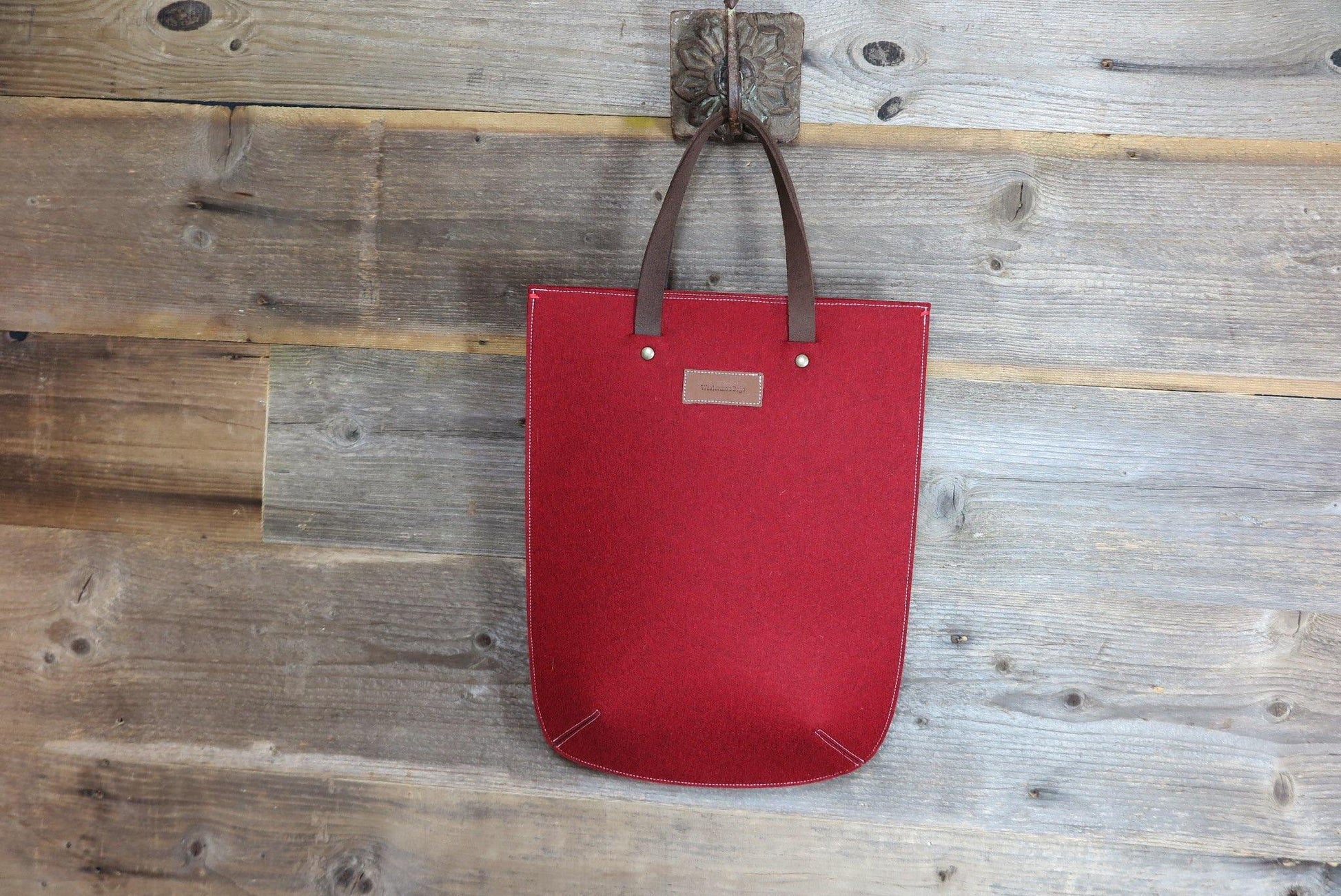 GRIFT tas in rood vilt laptoptas - pure wol - wijn rood - Westerman Bags vilten tassen en hoezen. Dutch Design.