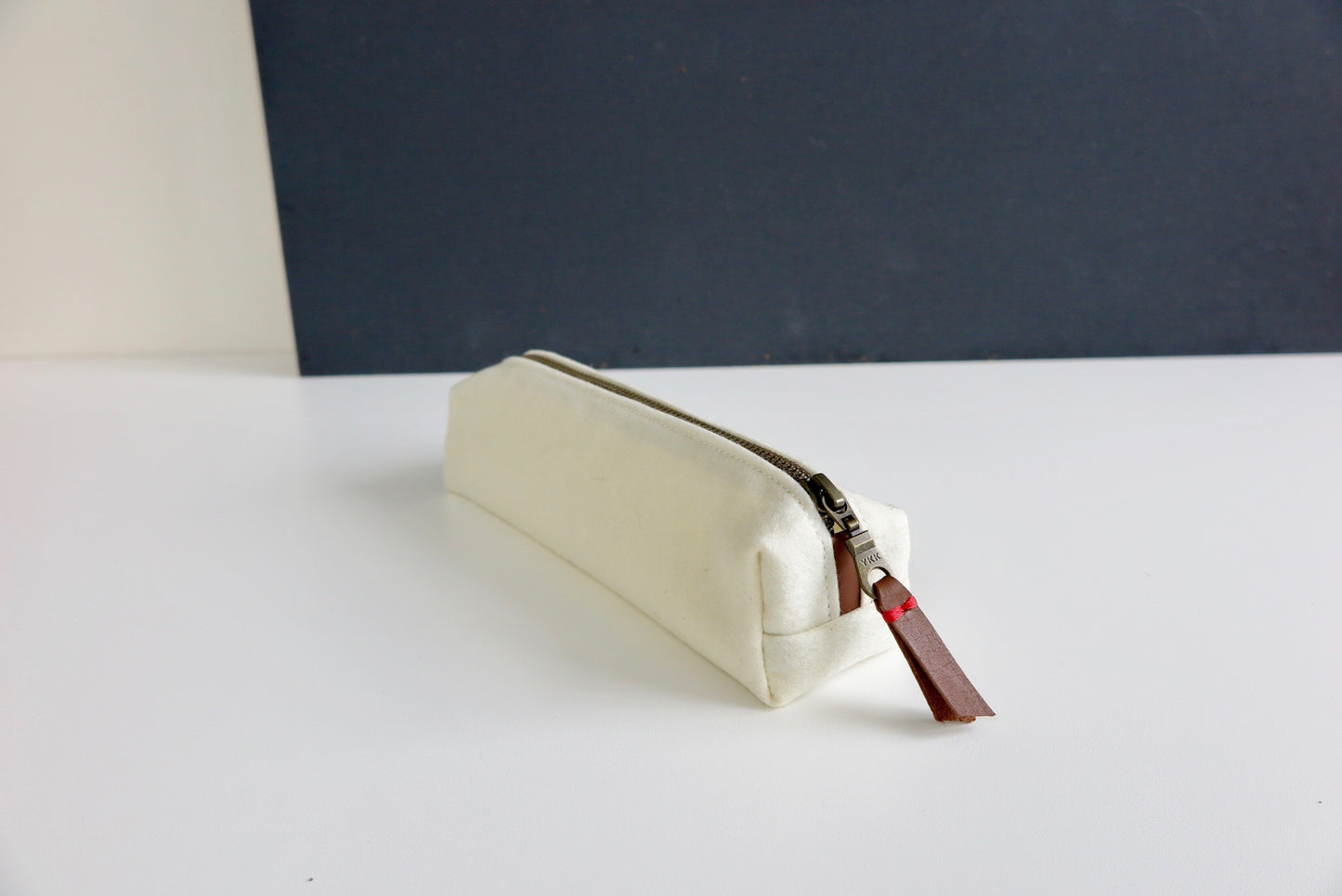 Minimalist off-white zipper pencil case