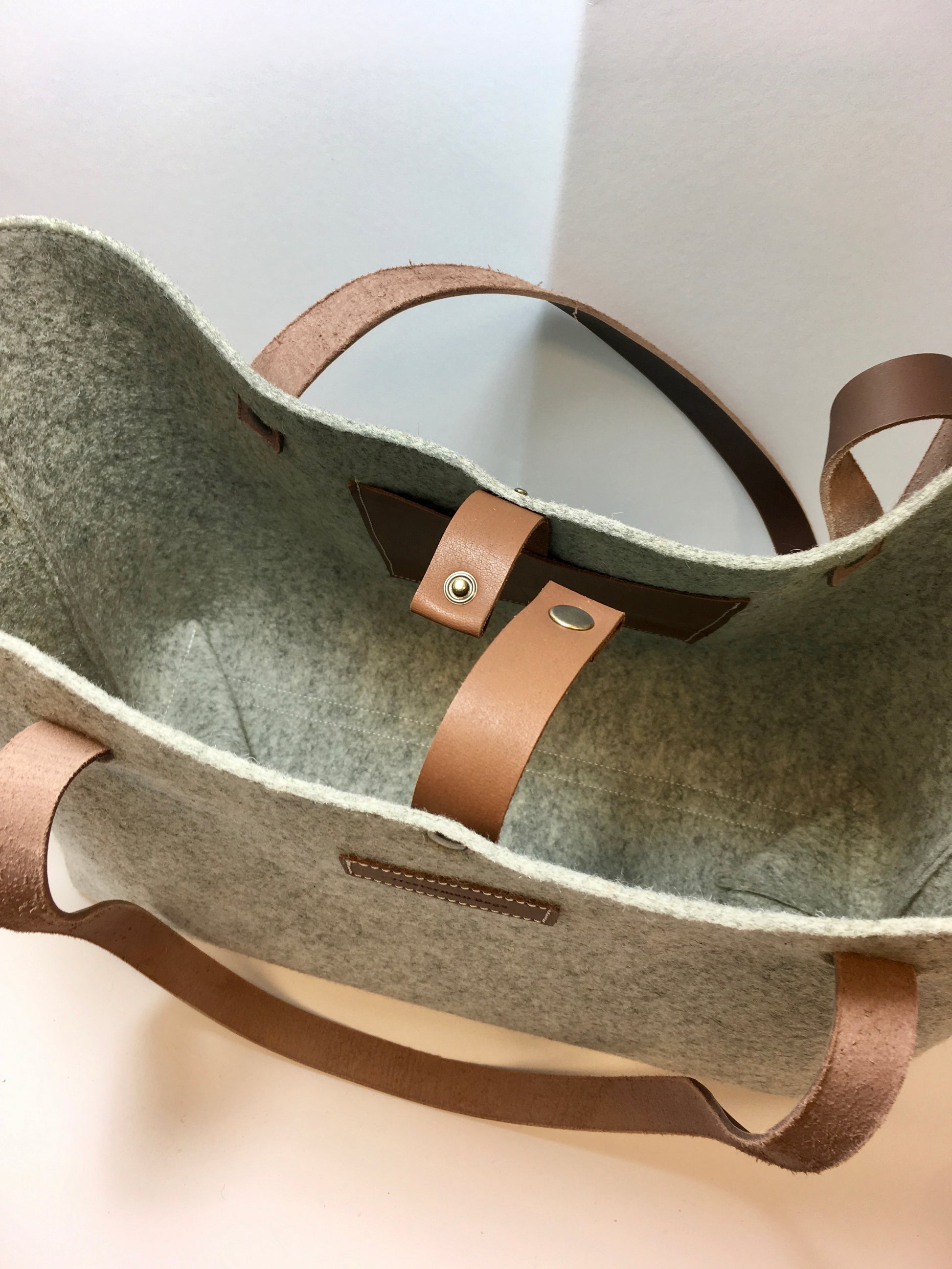 Interior of felt bag with leather details